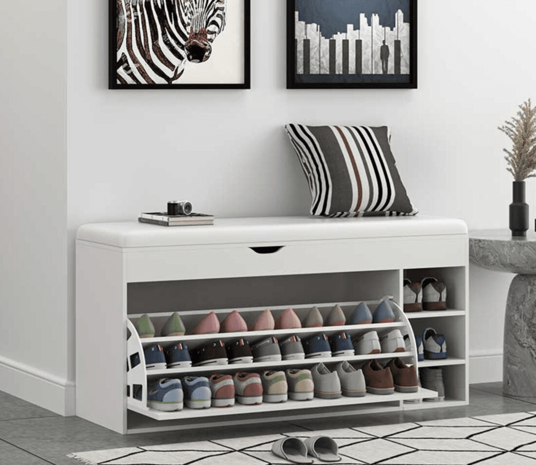 Organised shoe cabinet in a small HDB flat entrance styled by a feng shui master in Singapore for better energy flow.