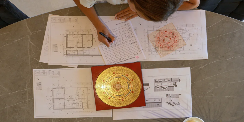 A feng shui mapping of a floor plan using a luo pan